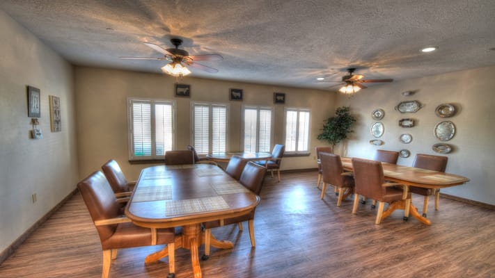 Bright common area with tables and chairs