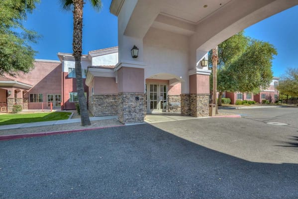 Entrance of a senior living facility with outdoor space