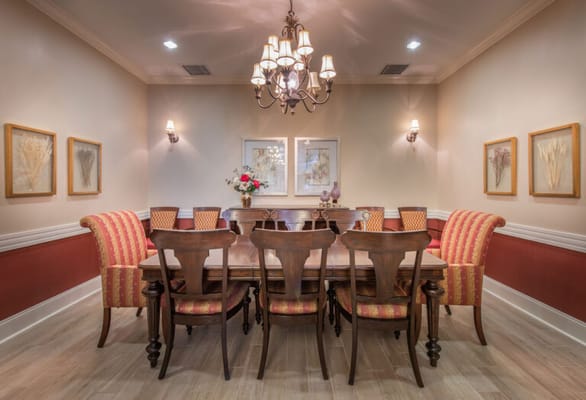 Elegant dining room setup with a large table and chairs