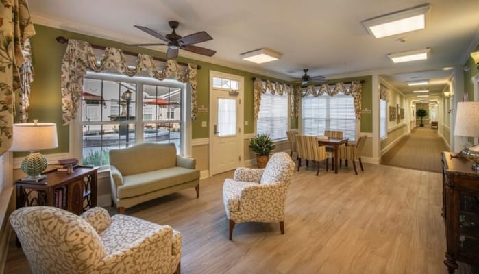 Bright common area with seating and natural light