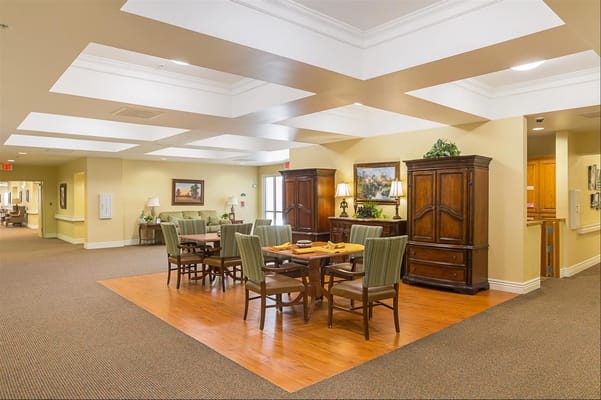 Common area with dining tables and seating