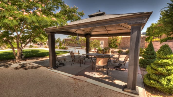 Shaded outdoor seating area in a garden