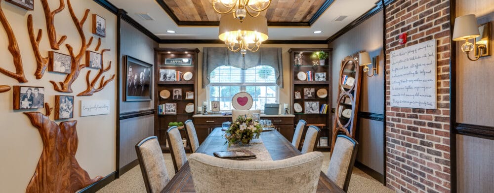 Stylish common area with a large wooden dining table
