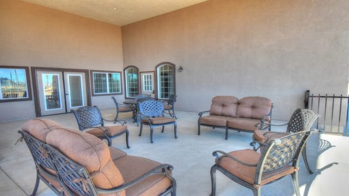 Outdoor seating area with chairs and tables