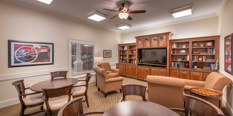 Cozy common area with seating and entertainment unit