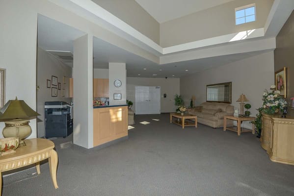 Bright common area with seating and decor