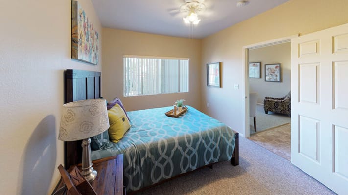 Cozy bedroom with colorful decor and natural light