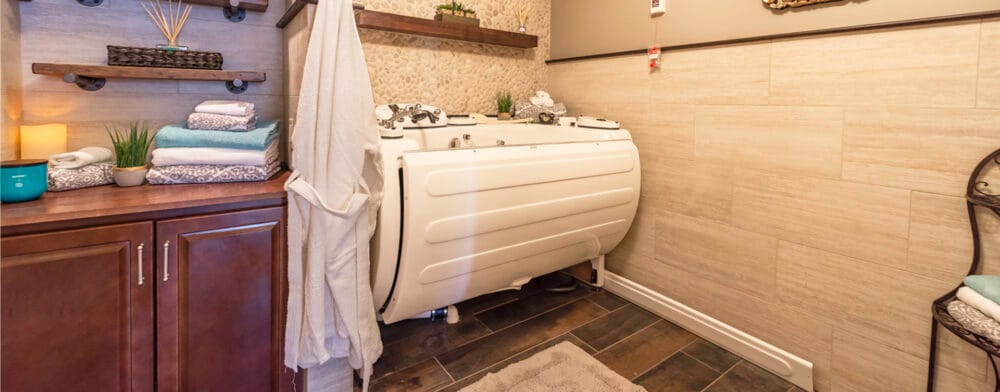 A cozy bathing area with towels and decor