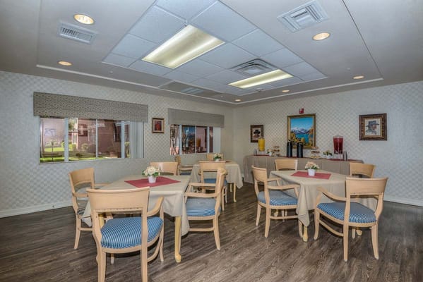 Bright interior common area with tables and chairs