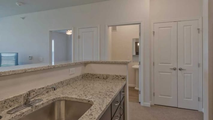 Interior view of a kitchen area with a small bar