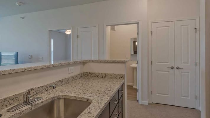 Interior view of a kitchen area with a small bar