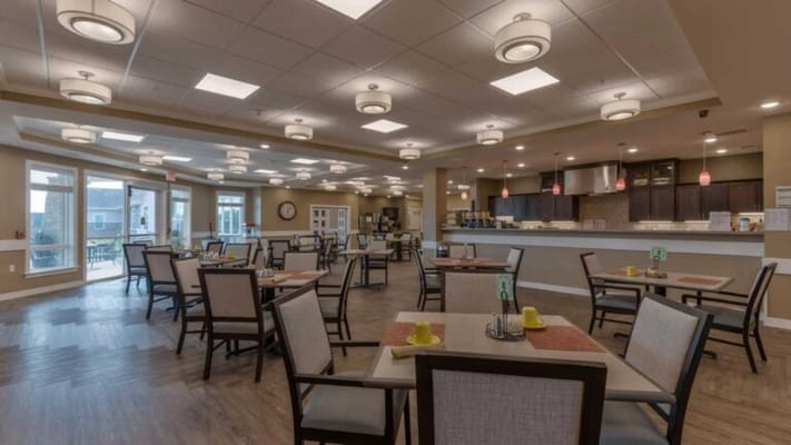 Bright dining area with tables and chairs