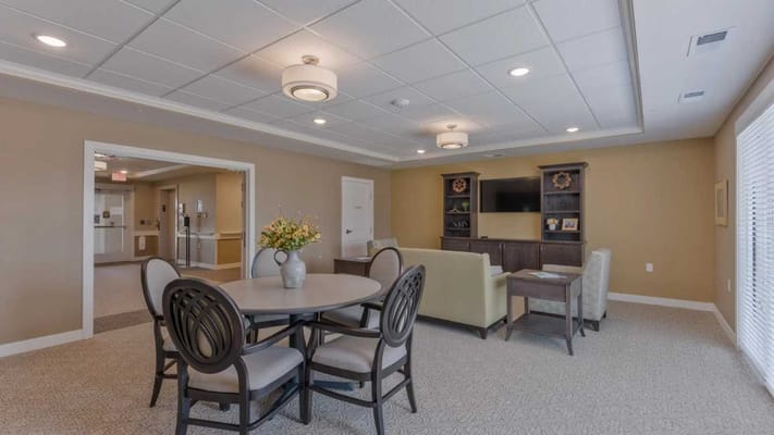 Bright common area with seating and decor