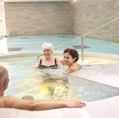 Residents enjoying a spa in a wellness area
