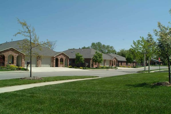 Street view of single-story senior living residences