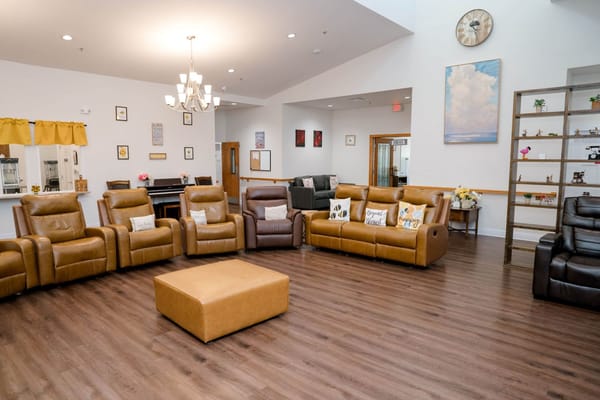 Common area with reclining chairs and decor