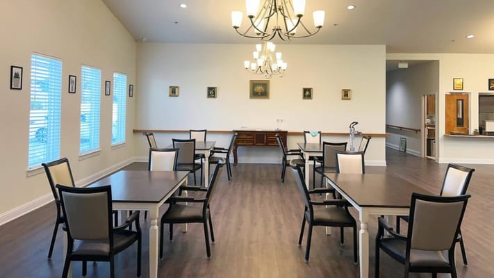 Bright dining room with tables and chairs