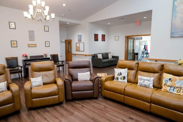 Comfortable lounge area with brown recliners