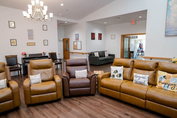 Comfortable lounge area with brown recliners
