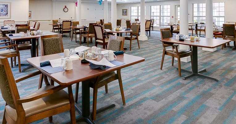 Dining area with tables set for meals