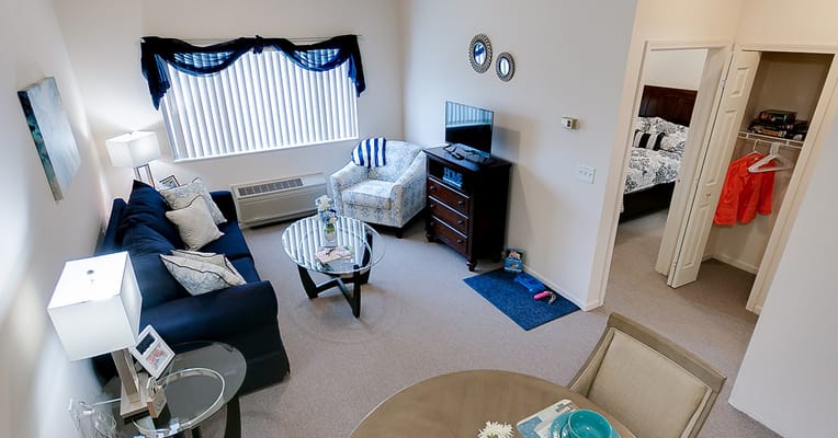 Interior of a private resident room with living area