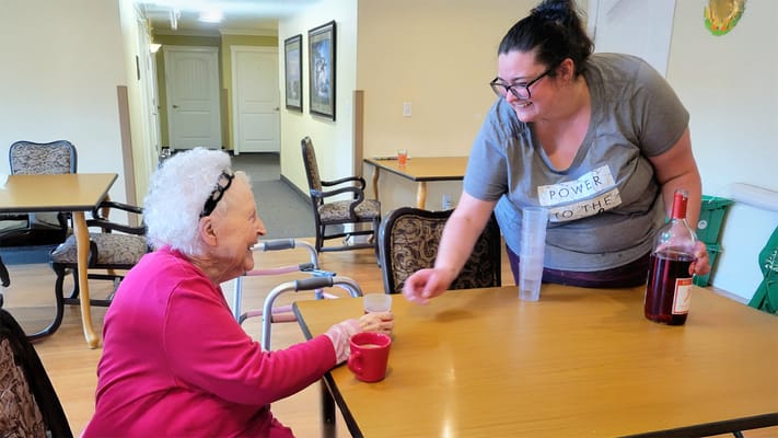 Residents enjoying a drink in a common area