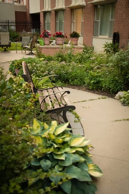 Garden area with benches and flower pots
