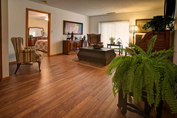 Interior view of a cozy common area with seating