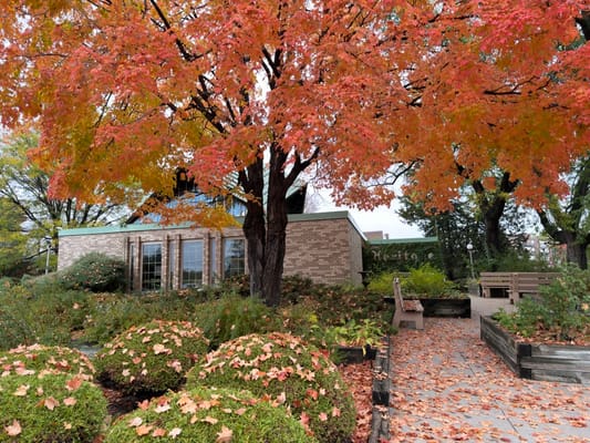 Scenic view of the facility's exterior with autumn foliage