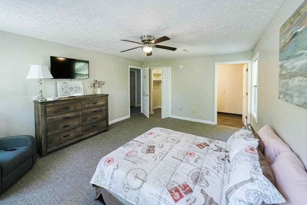 Private resident room with a bed and dresser