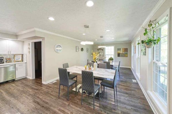 Bright dining area with modern furniture and decor