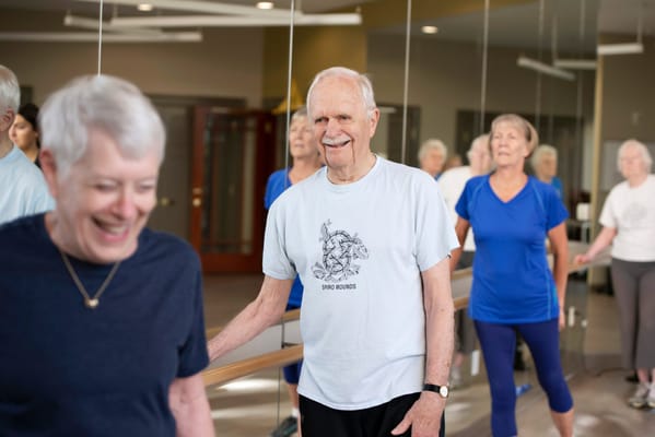 Residents participating in a group exercise class