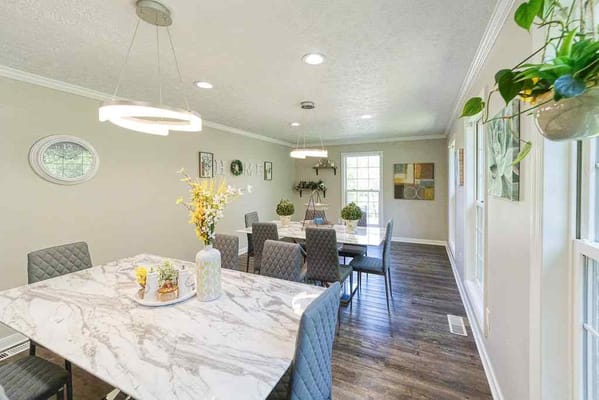 Bright dining area with modern decor and seating