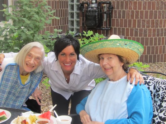 Residents enjoying a meal together outdoors