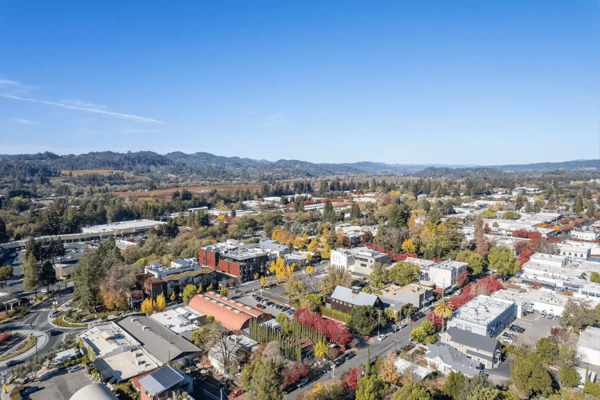 Aerial view of a senior living community in a picturesque setting