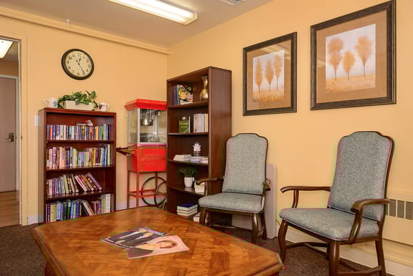Interior view of a cozy common area with seating