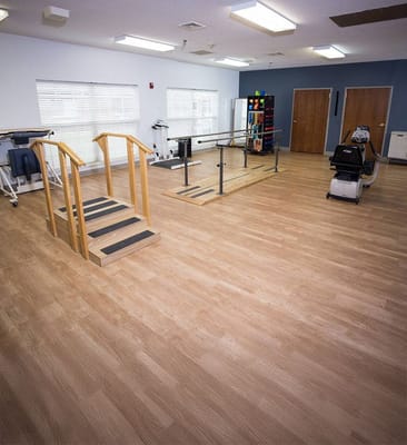 Rehabilitation room with equipment and walking aids