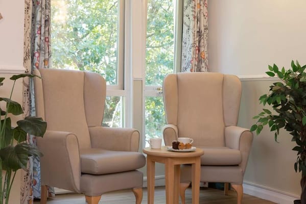 Cozy common area with armchairs and a small table