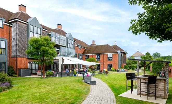 Residents enjoying the outdoor space at Eden Court Retirement Village