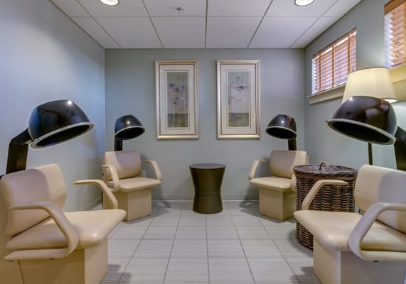 Seating area with hair salon chairs and decor