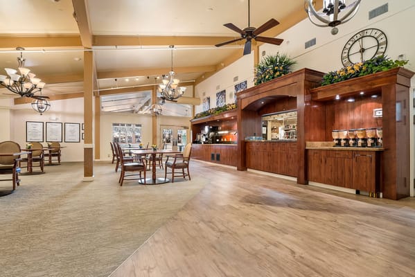 Bright dining area with wooden furniture and decor