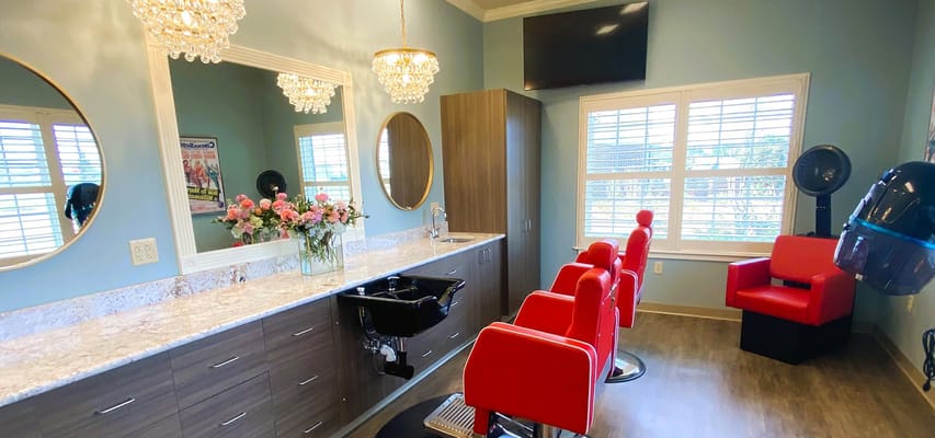 Beauty salon area with modern styling stations