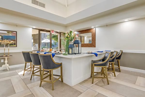 Dining area with tables and decorative centerpiece