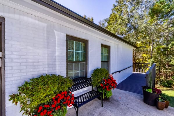 Well-kept outdoor seating area with flowers