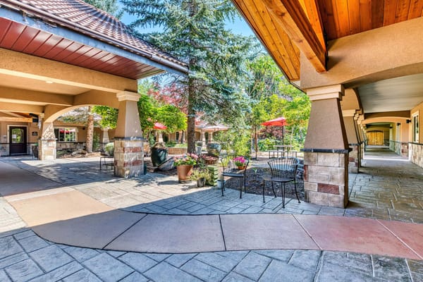 Outdoor courtyard with seating and landscaping