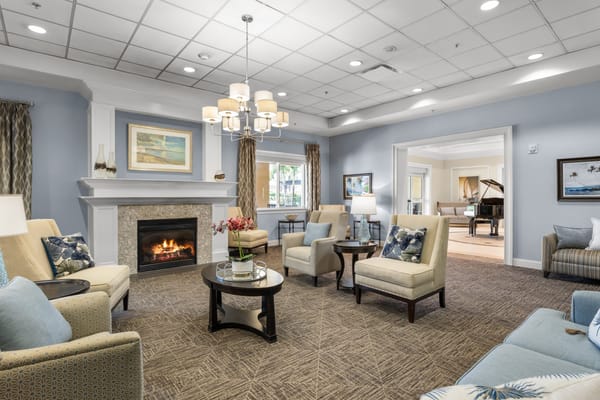 Cozy common area with seating and fireplace