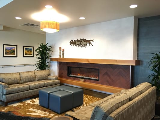 Cozy common area with comfortable seating and fireplace