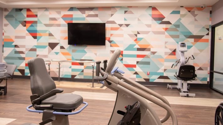 Fitness equipment in a bright activity room