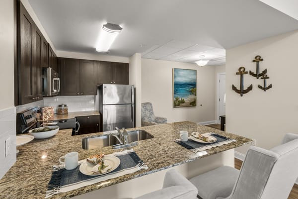 Modern kitchen area with dining setup