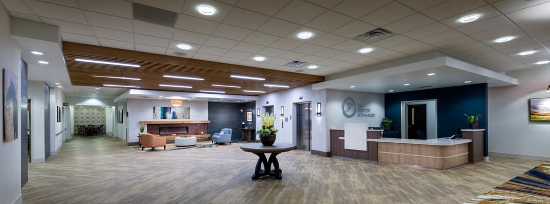 Bright and spacious lobby area with a reception desk